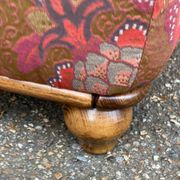 Solid wood and fabric club chair with footrest