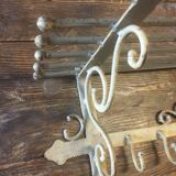 White wrought iron coat/hat rack