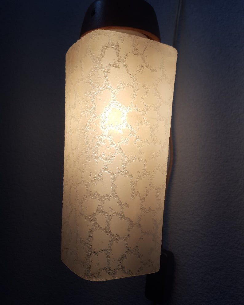 Wooden applique with 60s glass blind