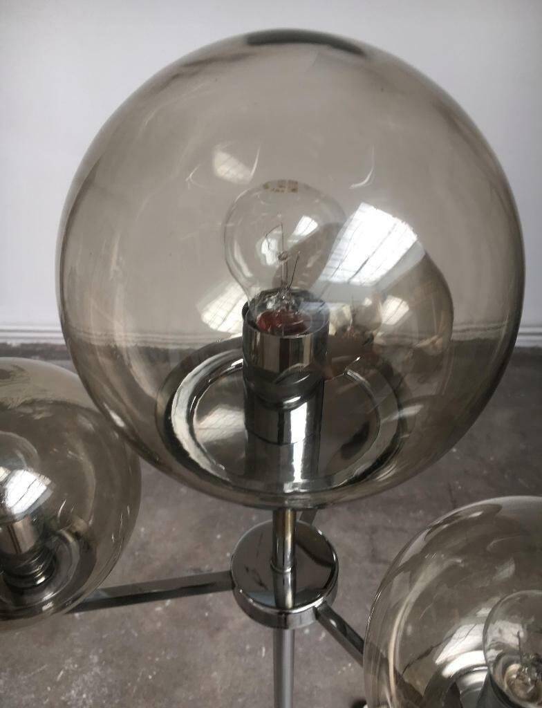 Chrome and glass floor lamp in mid-century German space style by Hustadt Leuchten, 1960s.