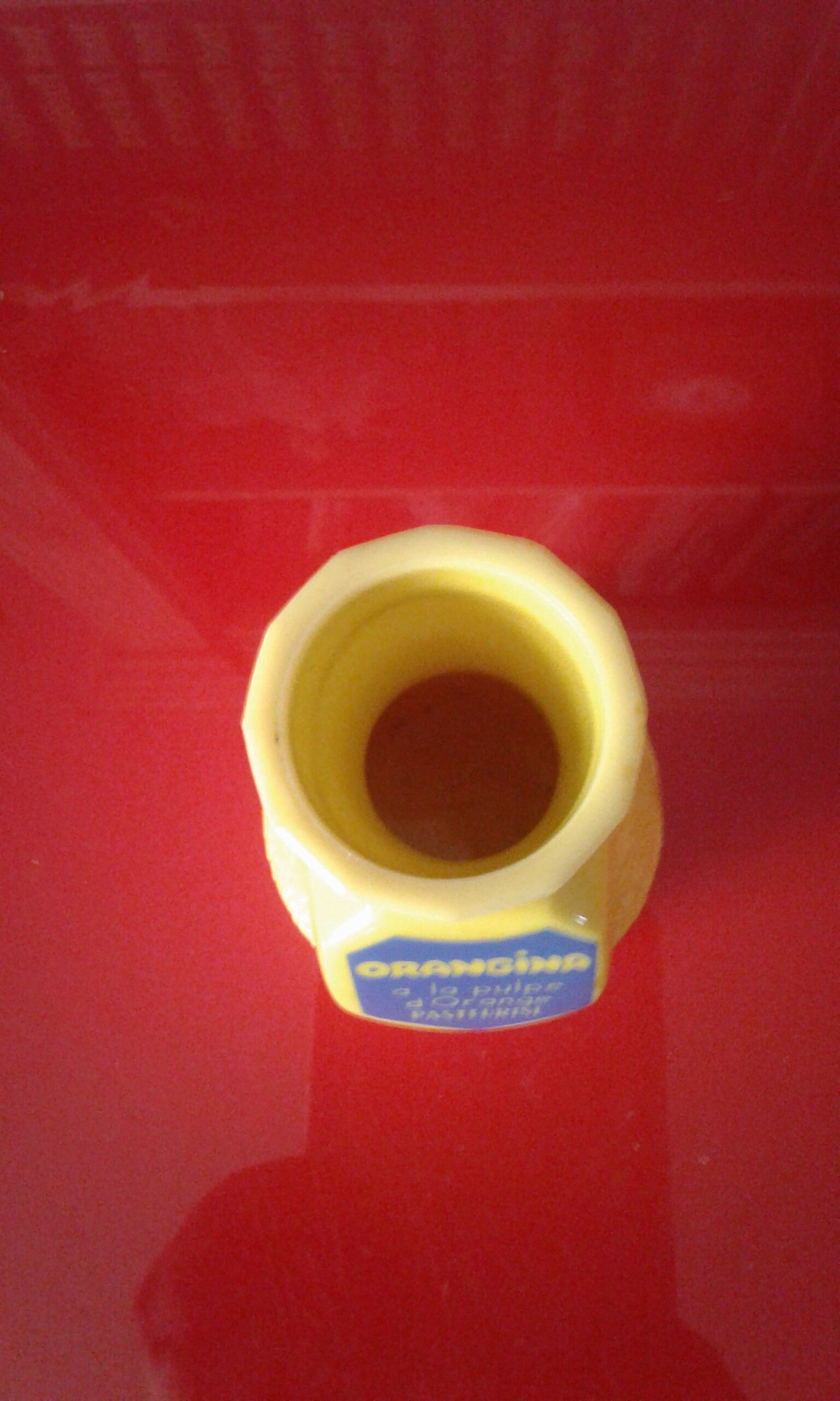 Vintage orangina straw holder