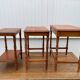 Set of 3 rustic cherry wood nesting coffee tables from the 1950s.