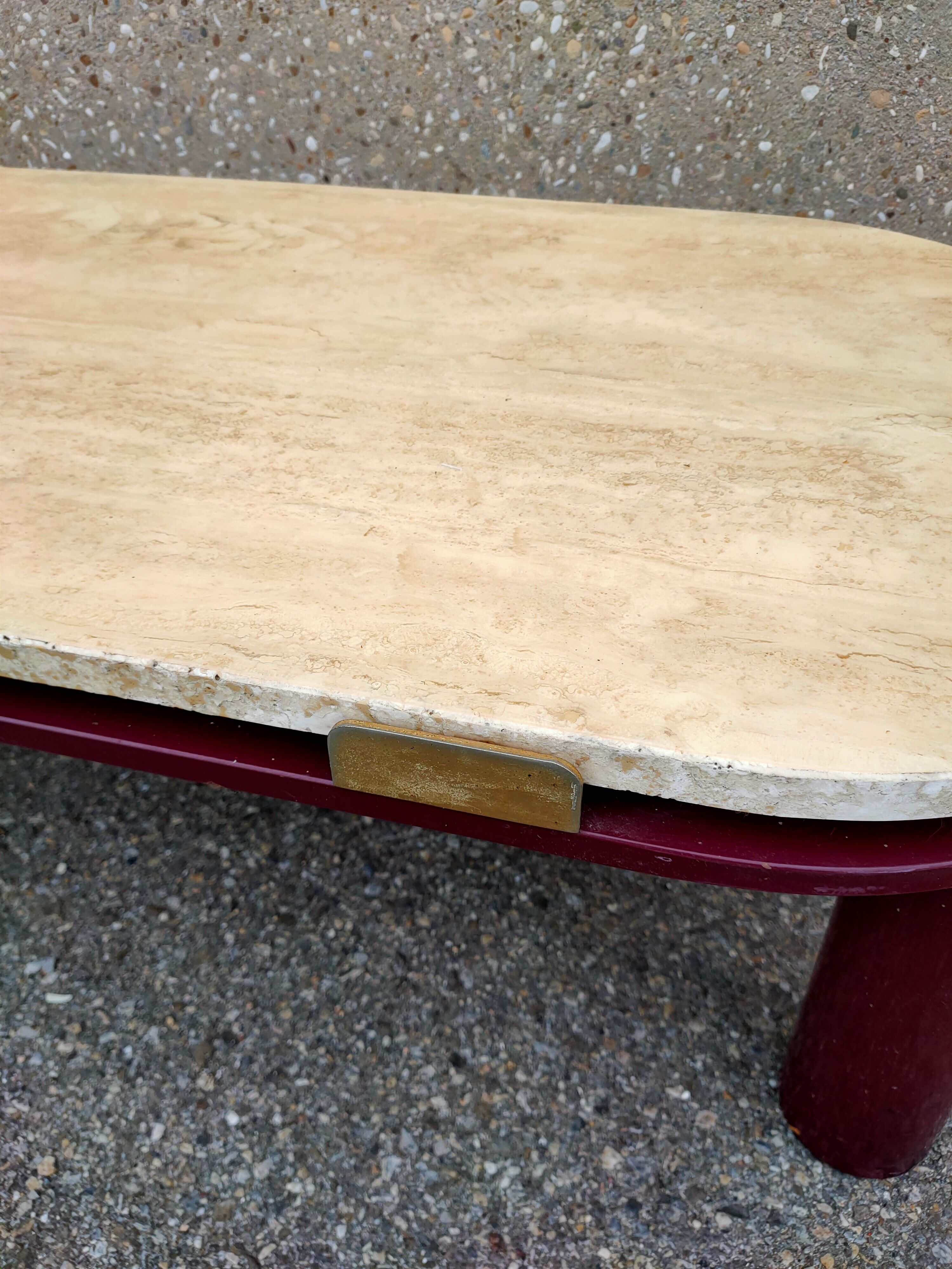 Coffee table Travertine top, garnet-colored metal stand and legs.  Long
