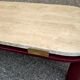 Coffee table Travertine top, garnet-colored metal stand and legs.  Long
