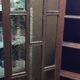 Parisian glass-fronted cabinet, Art Deco vintage bookshelf, solid oak furniture.