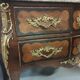Commode sauteuse en marqueterie style Louis XV