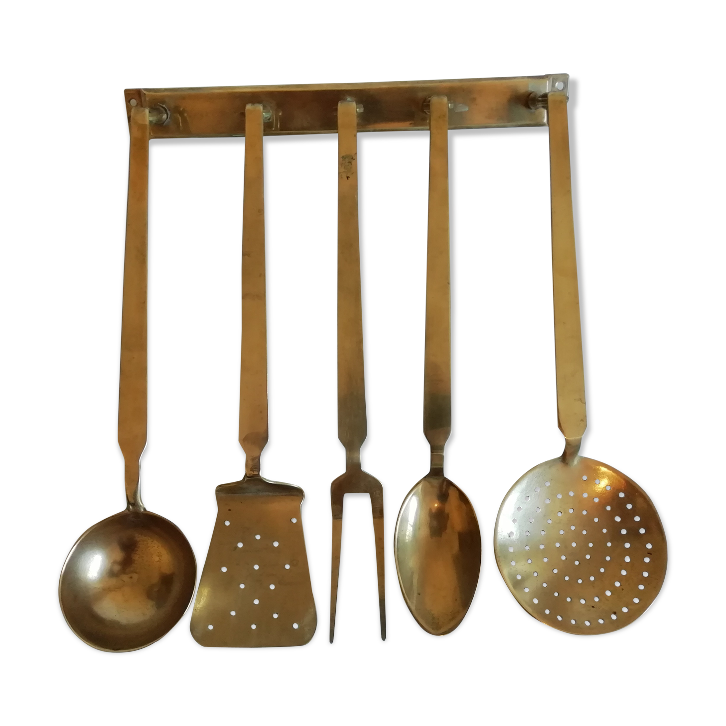 Set of brass kitchen utensils. Early XXeme