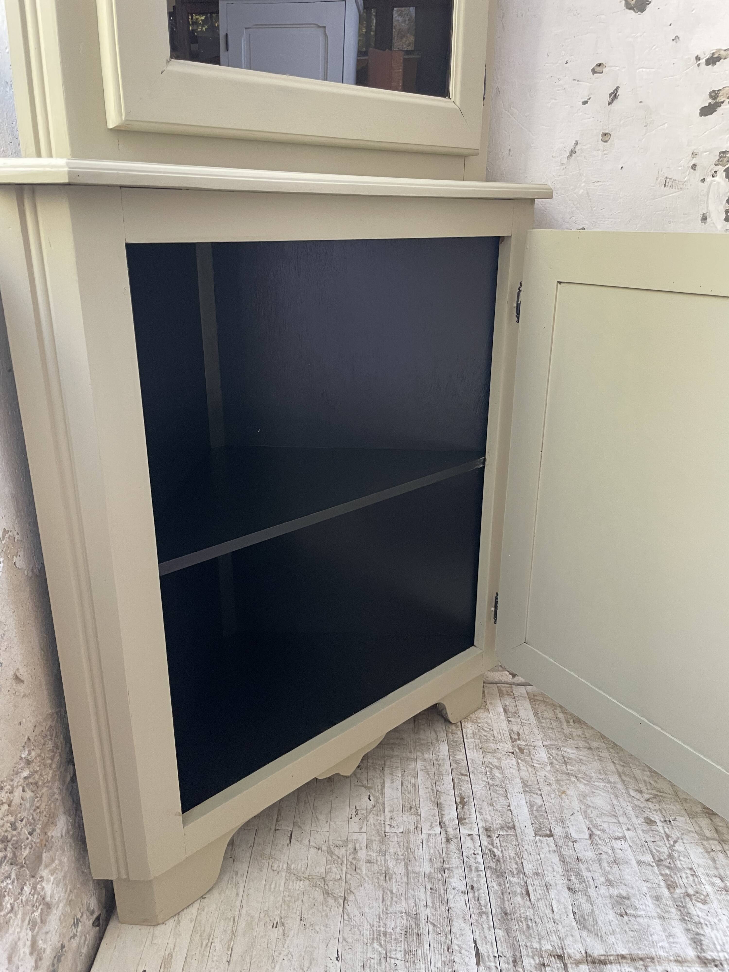 Corner display cabinet from the 1950s