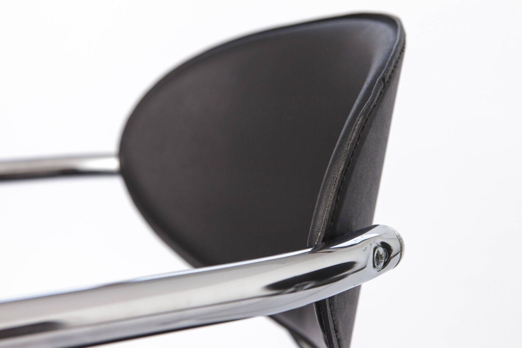 Effezeta chair, tubular chrome structure and black faux leather, made in Italy.