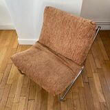 Beige and chrome armchair