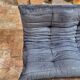 Togo sofa by Ligne Roset and its pouf from the 1970s.