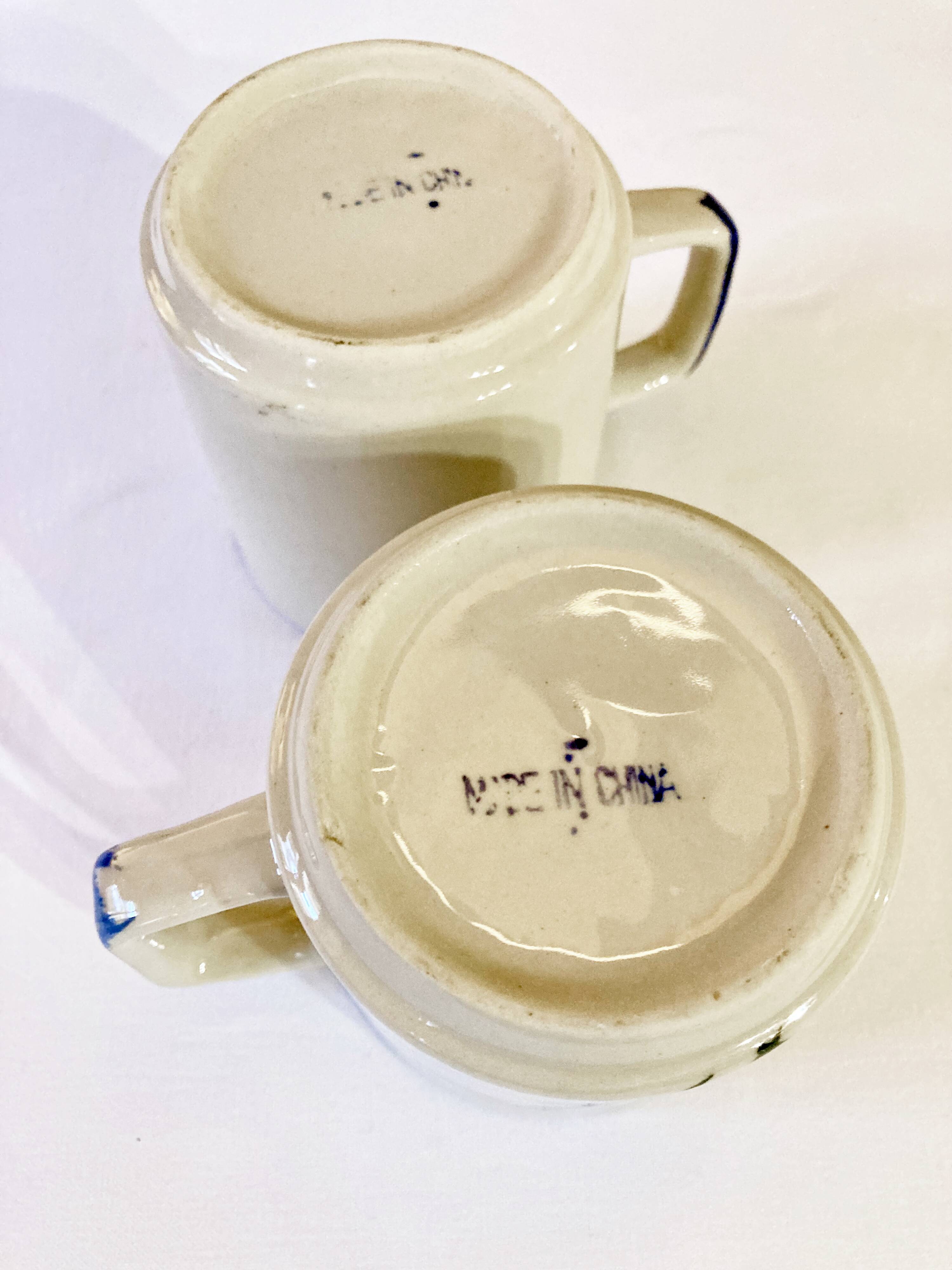 Pair of hand-painted Chinese ceramic mugs