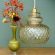 Suspension globe vintage en verre ambré