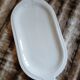12 flat plates in earthenware/fish