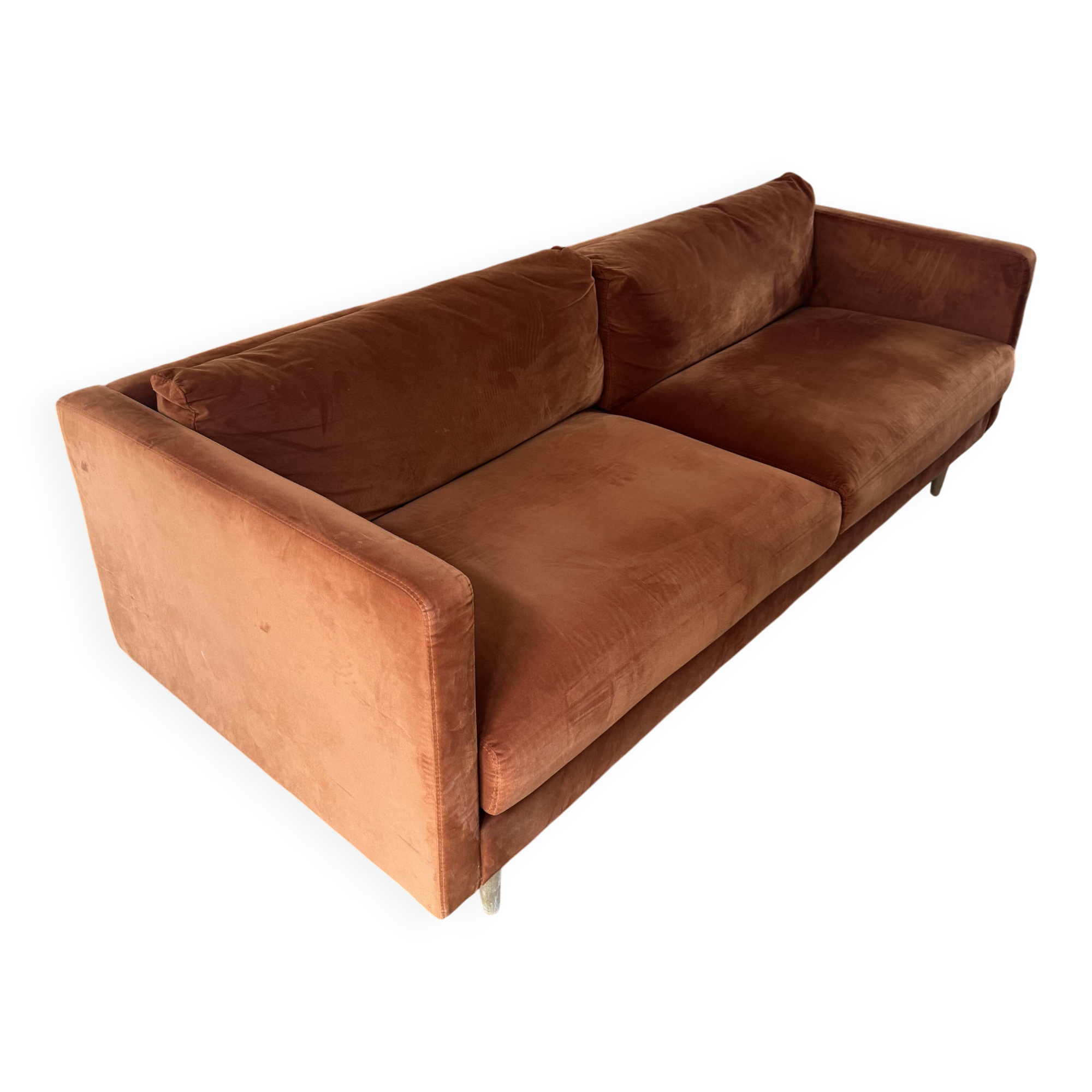 Orange velvet sofa