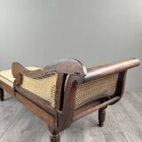 Louis XVI style meridian in carved wood and caning, 19th century.