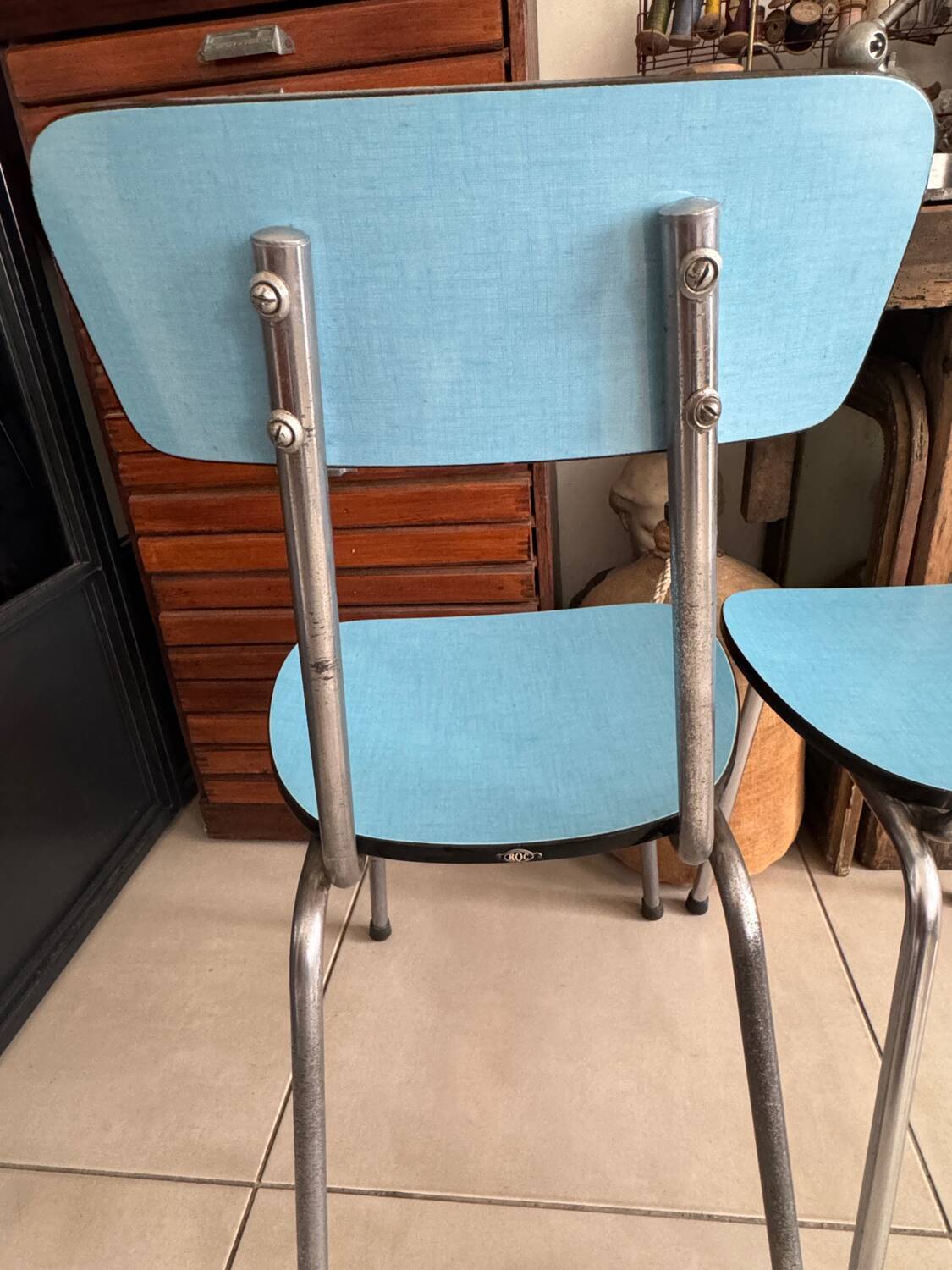 Pair of vintage blue Formica chairs