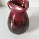 Vintage pitcher in raspberry red and chocolate flamed ceramic.