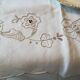 Round off-white tablecloth embroidered with grey flowers with 8 matching napkins - festive table