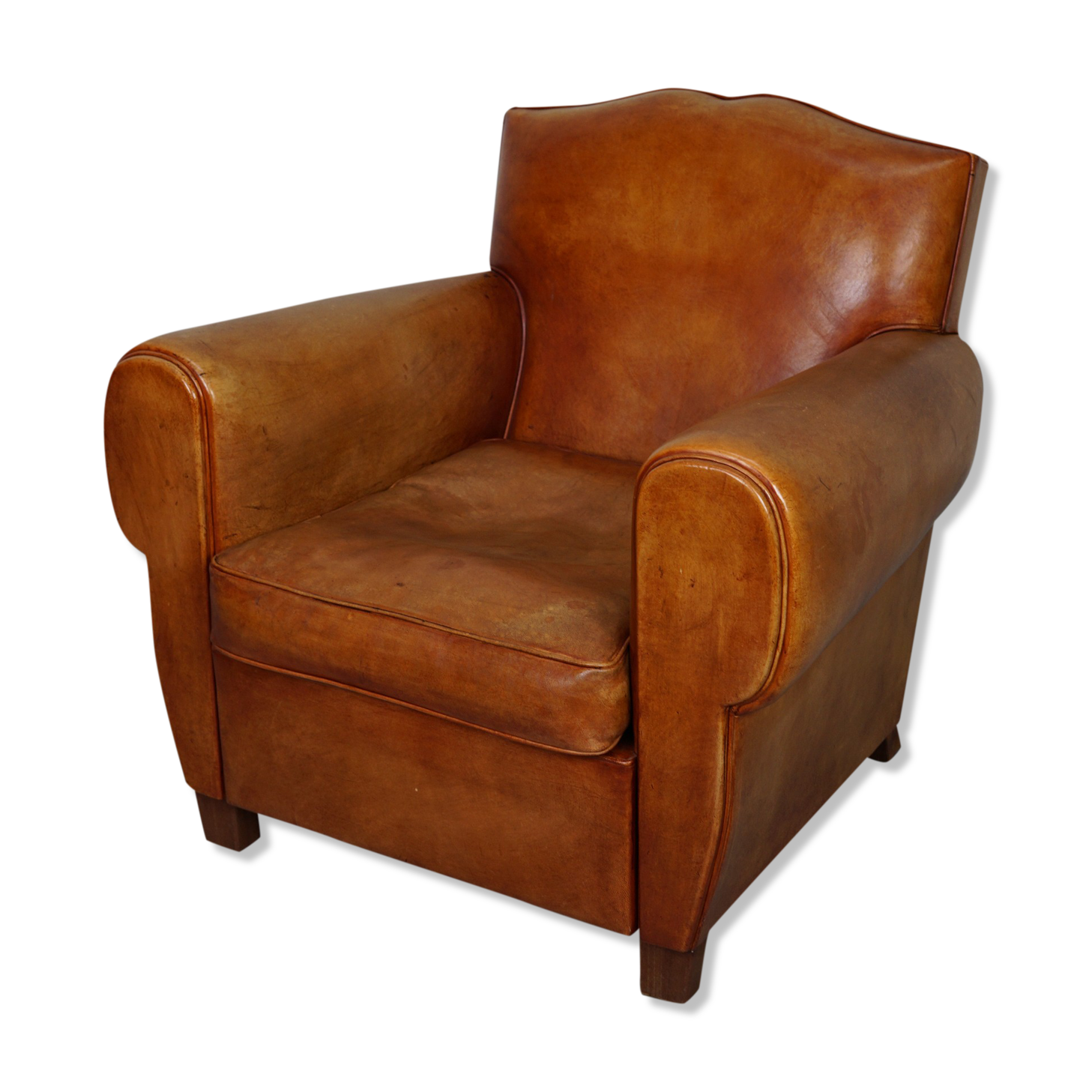 Vintage french moustache back cognac-colored leather club chair