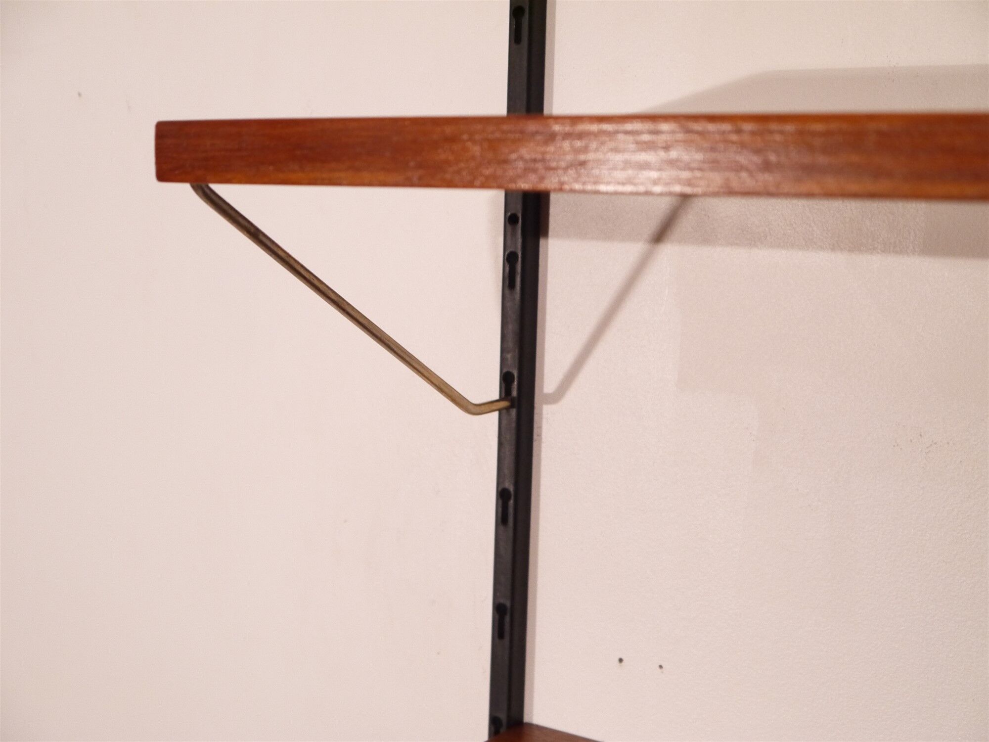 Scandinavian teak and brass metal shelf