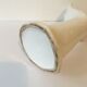 Hand soliflore wearing white ring