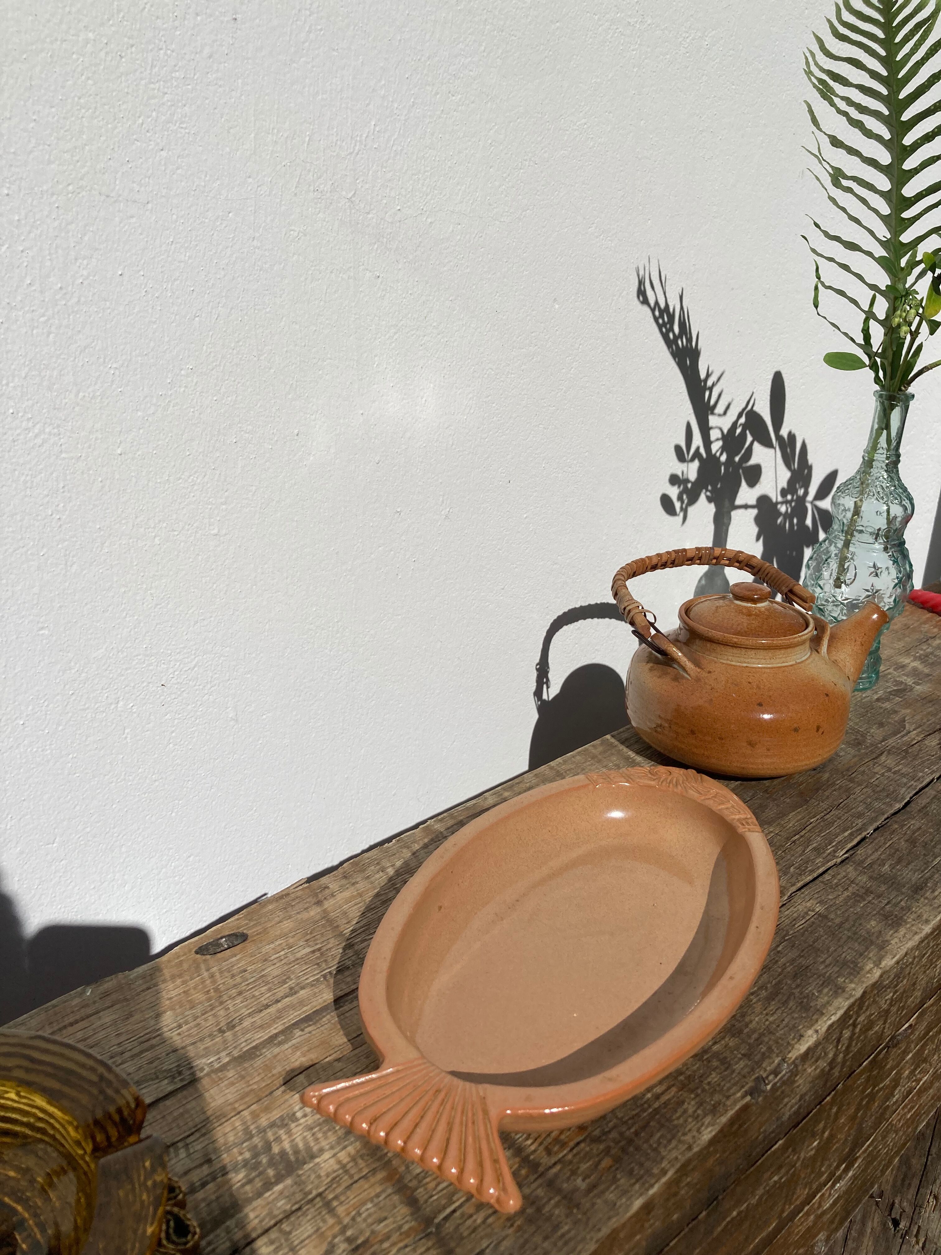 Oval brown ceramic fish dish