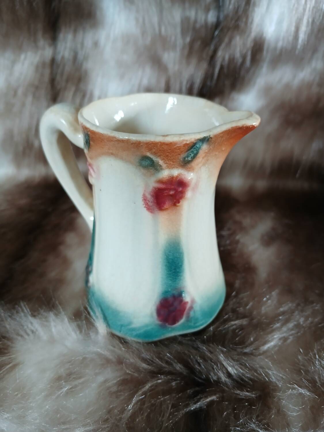 Antique slipware milk jug