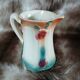 Antique slipware milk jug