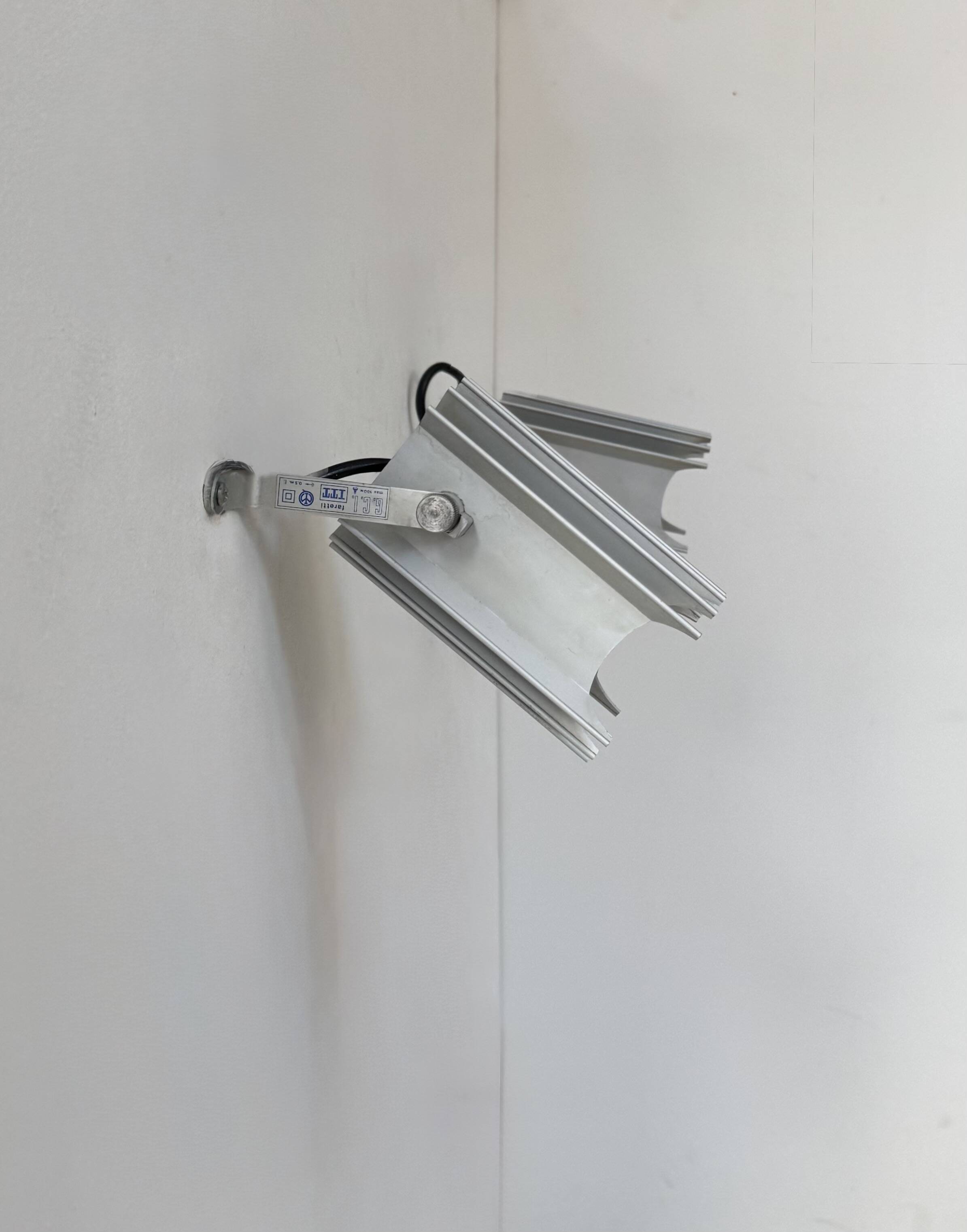 Pair of vintage wall lights, aluminium cast, Italy, 1980.