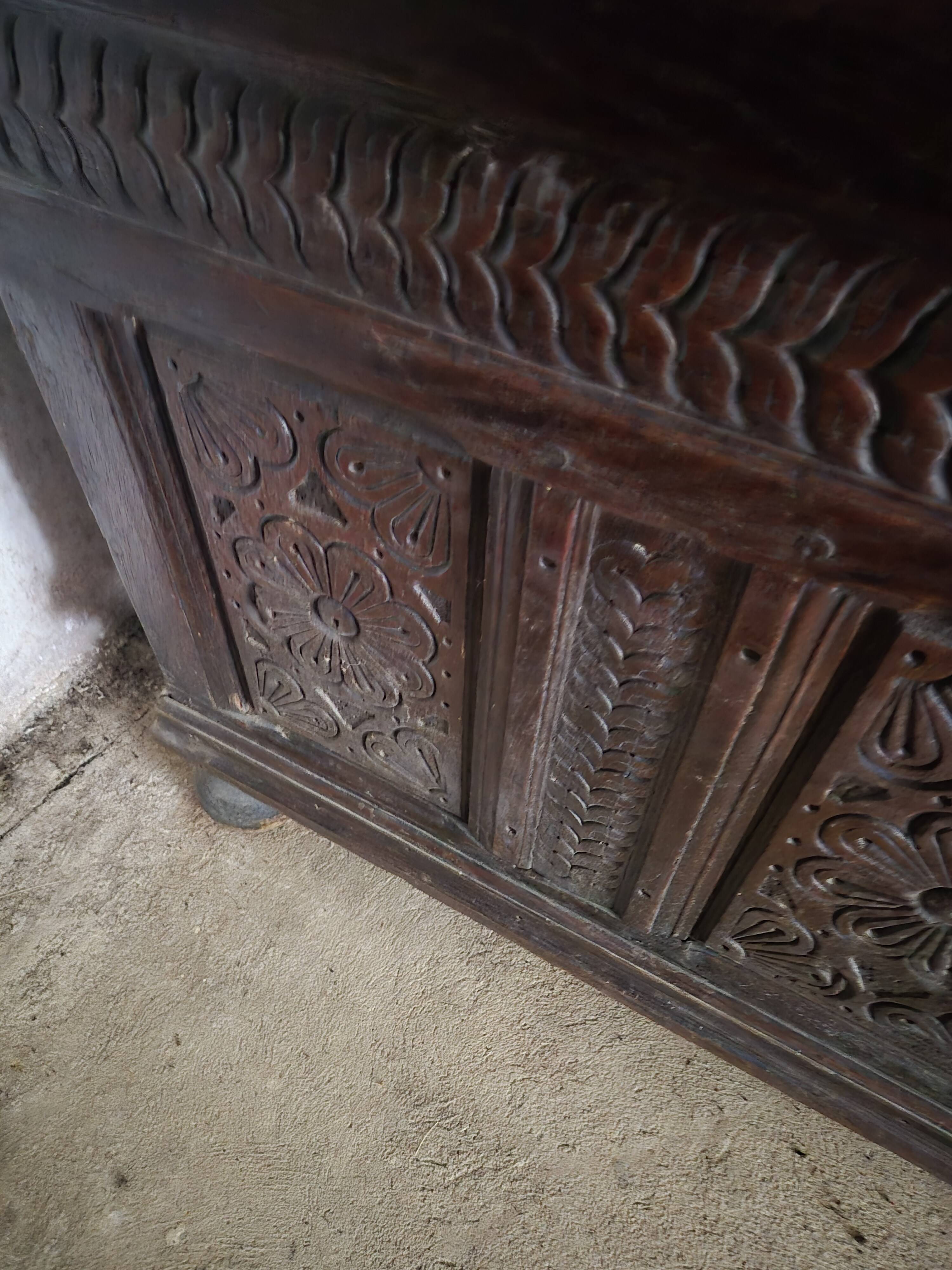 Large carved oak chest from the 17th century.