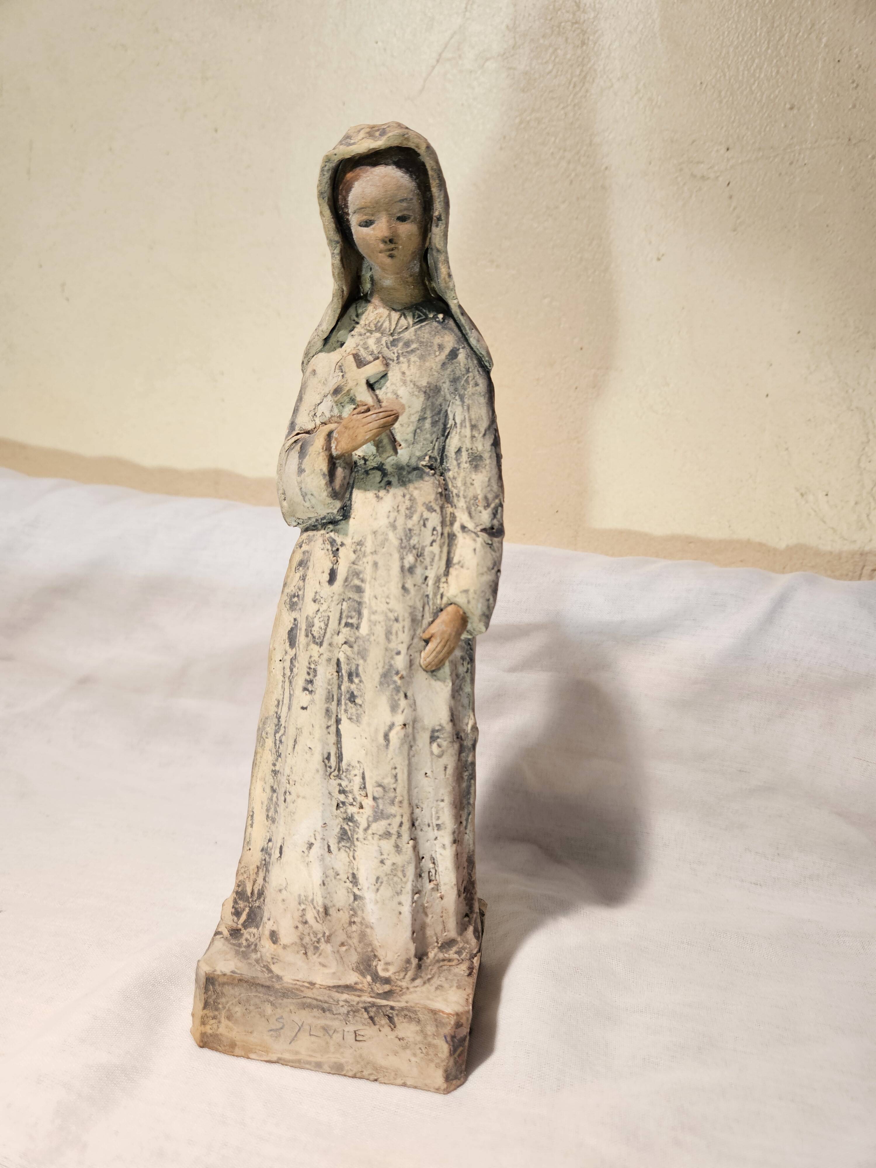 Painted terracotta holy virgin statue