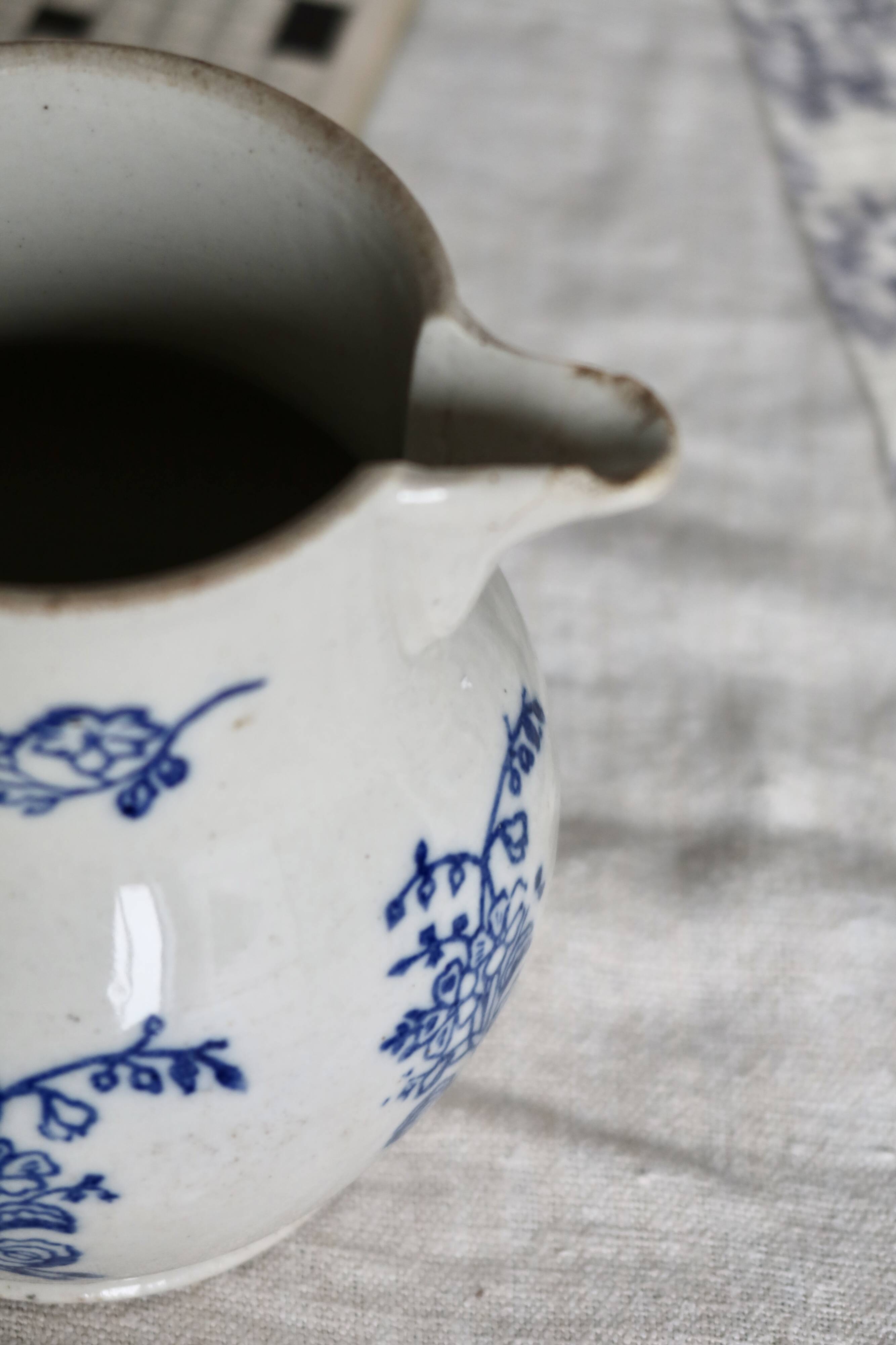 Antique Saint-Uze steel clay pitcher with cobalt blue floral pattern