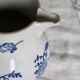 Antique Saint-Uze steel clay pitcher with cobalt blue floral pattern