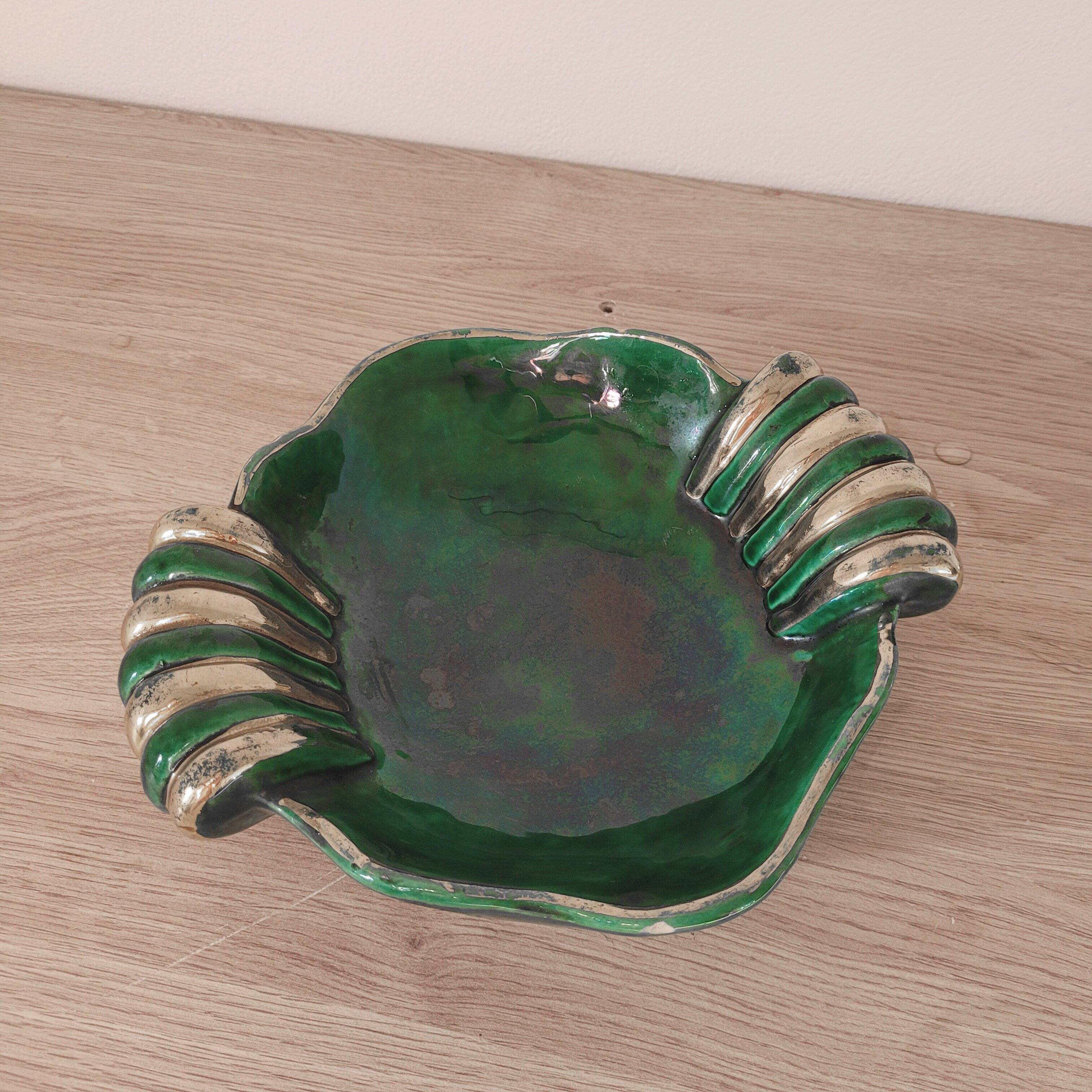 Green and gold pocket emptier