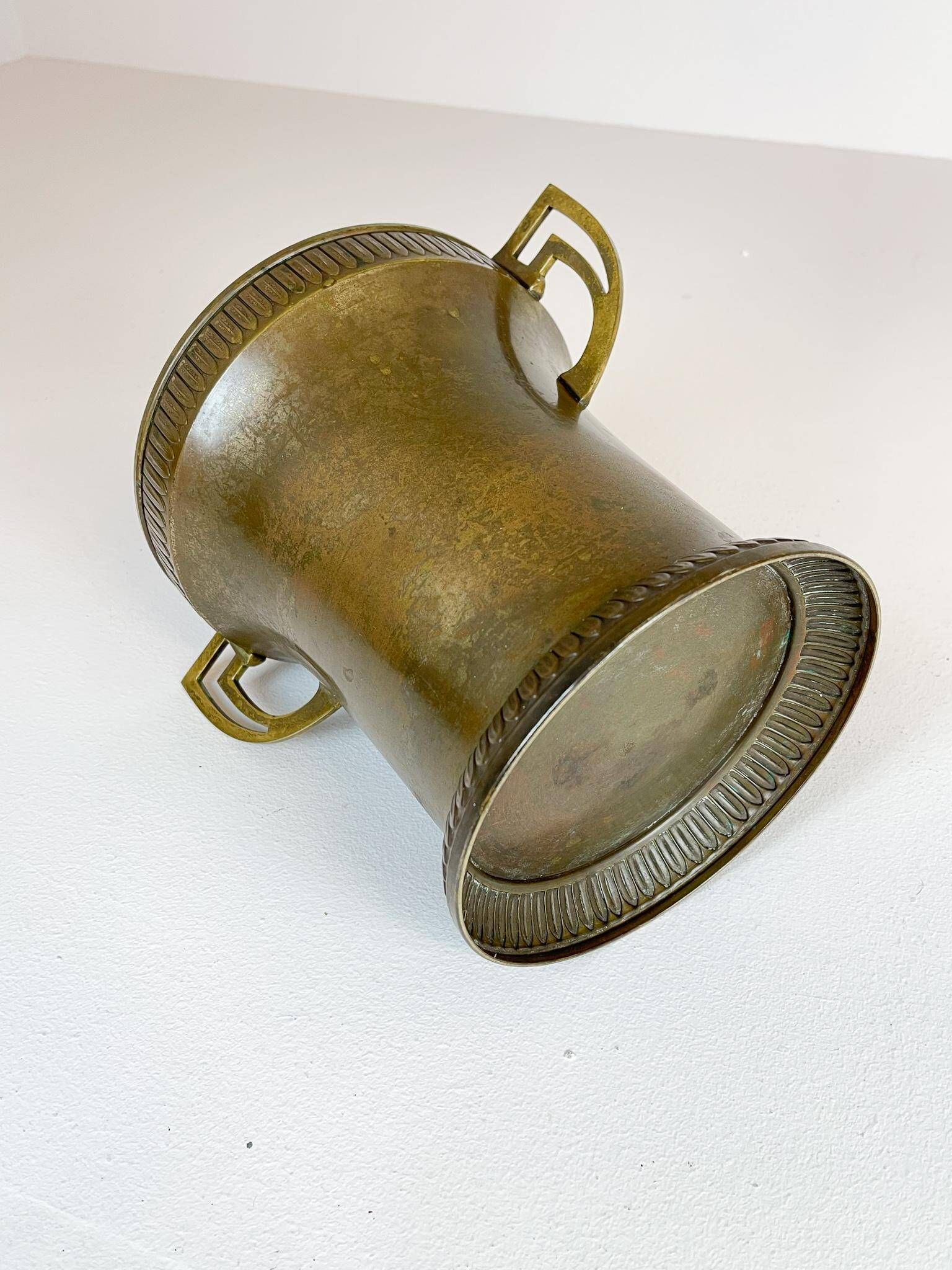 Art Deco champagne cooler in copper and brass with relief patterns, Sweden, 1930s.