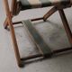 Foldable chair in solid wood and striped fabric, circa 1900.