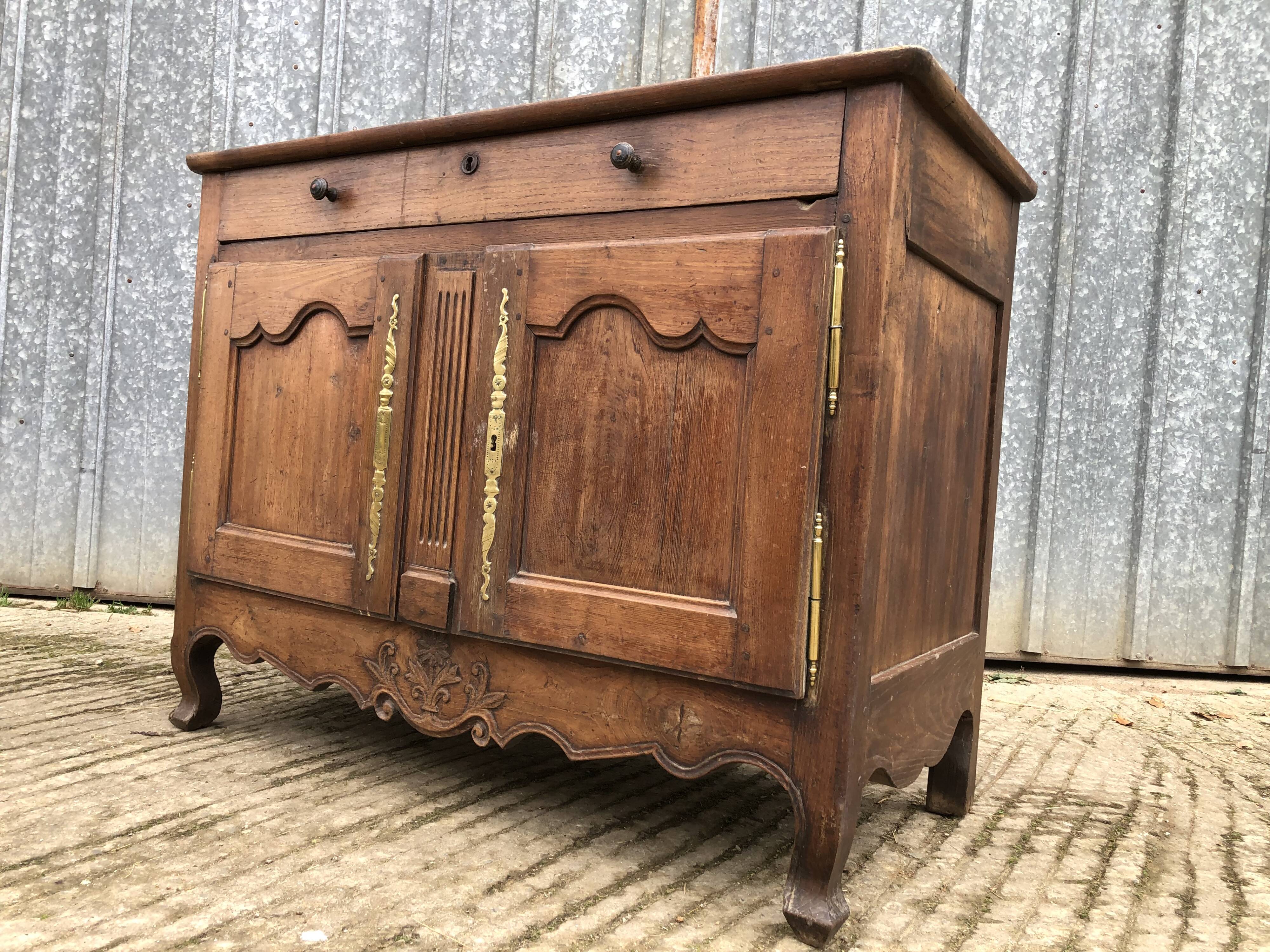 Antique Louis XV low chestnut sideboard with 2 doors and 1 drawer.