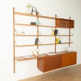 Classic shelving system from the 1950s in teak veneer by Poul Cadovius for Cado