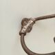 Antique steel wall-mounted coat rack