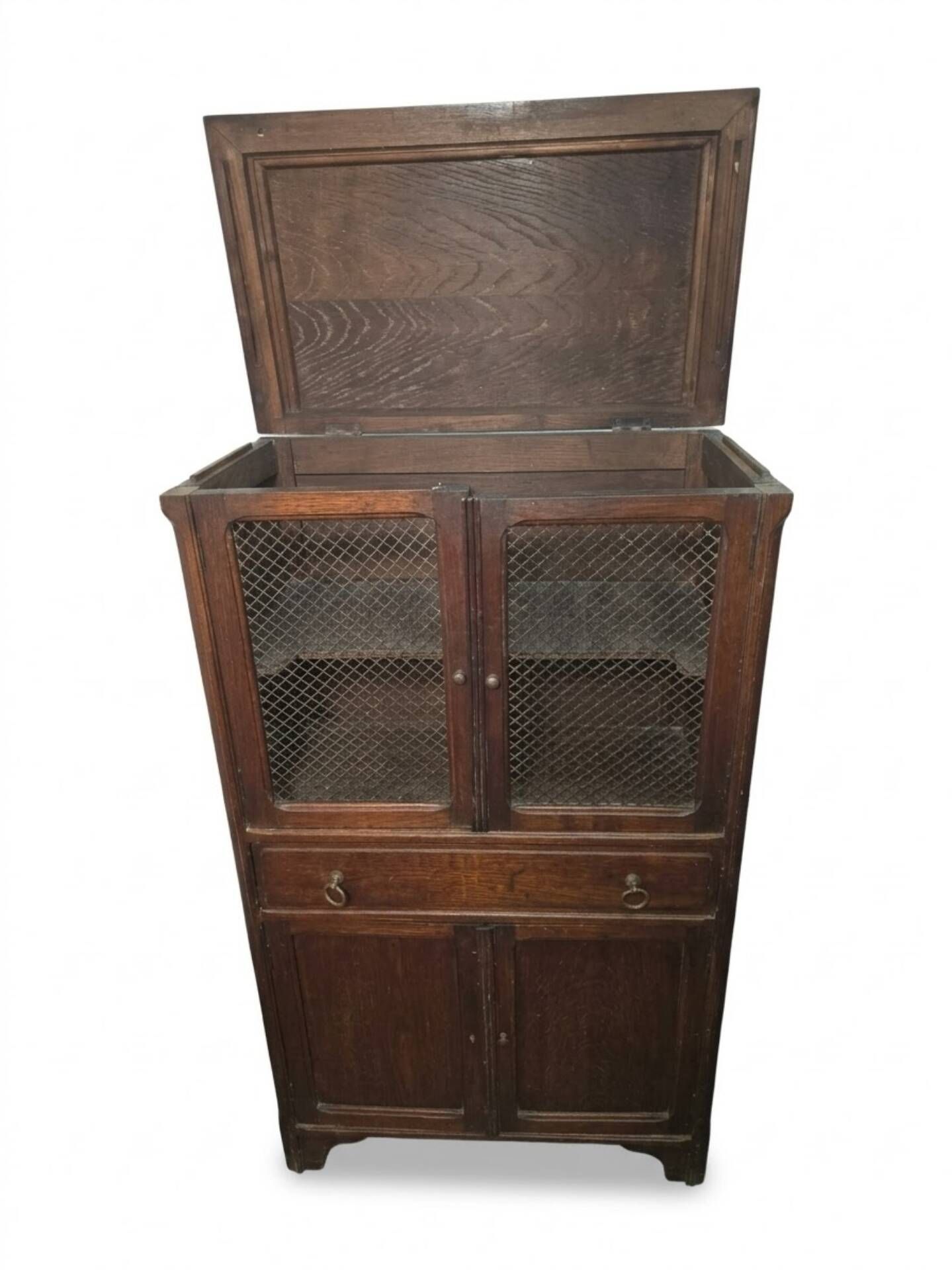 Vintage oak furniture with mesh doors.