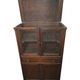 Vintage oak furniture with mesh doors.