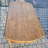 12-foot round oak table with 7 extensions / 20 people