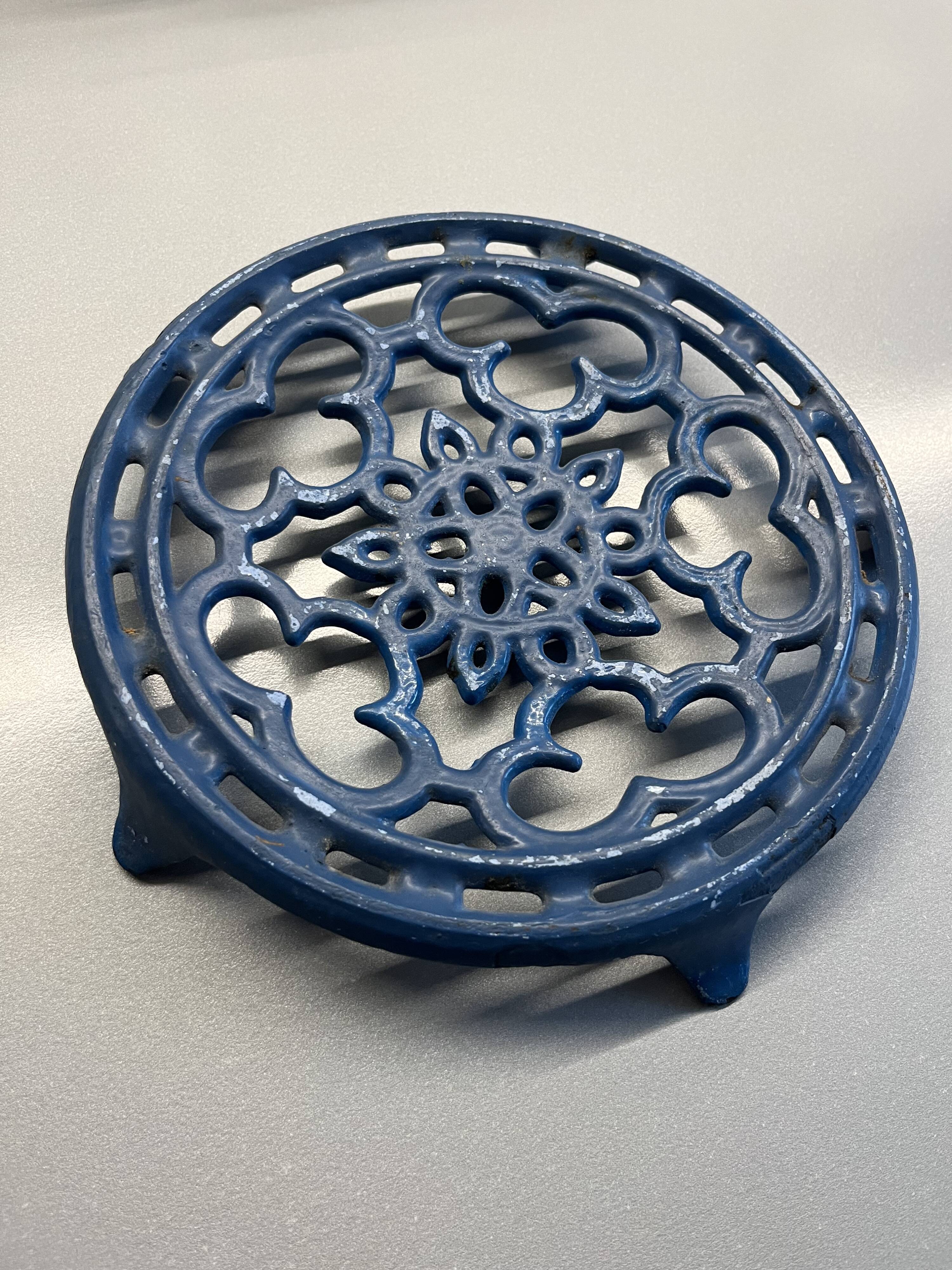 Old blue cast iron trivety