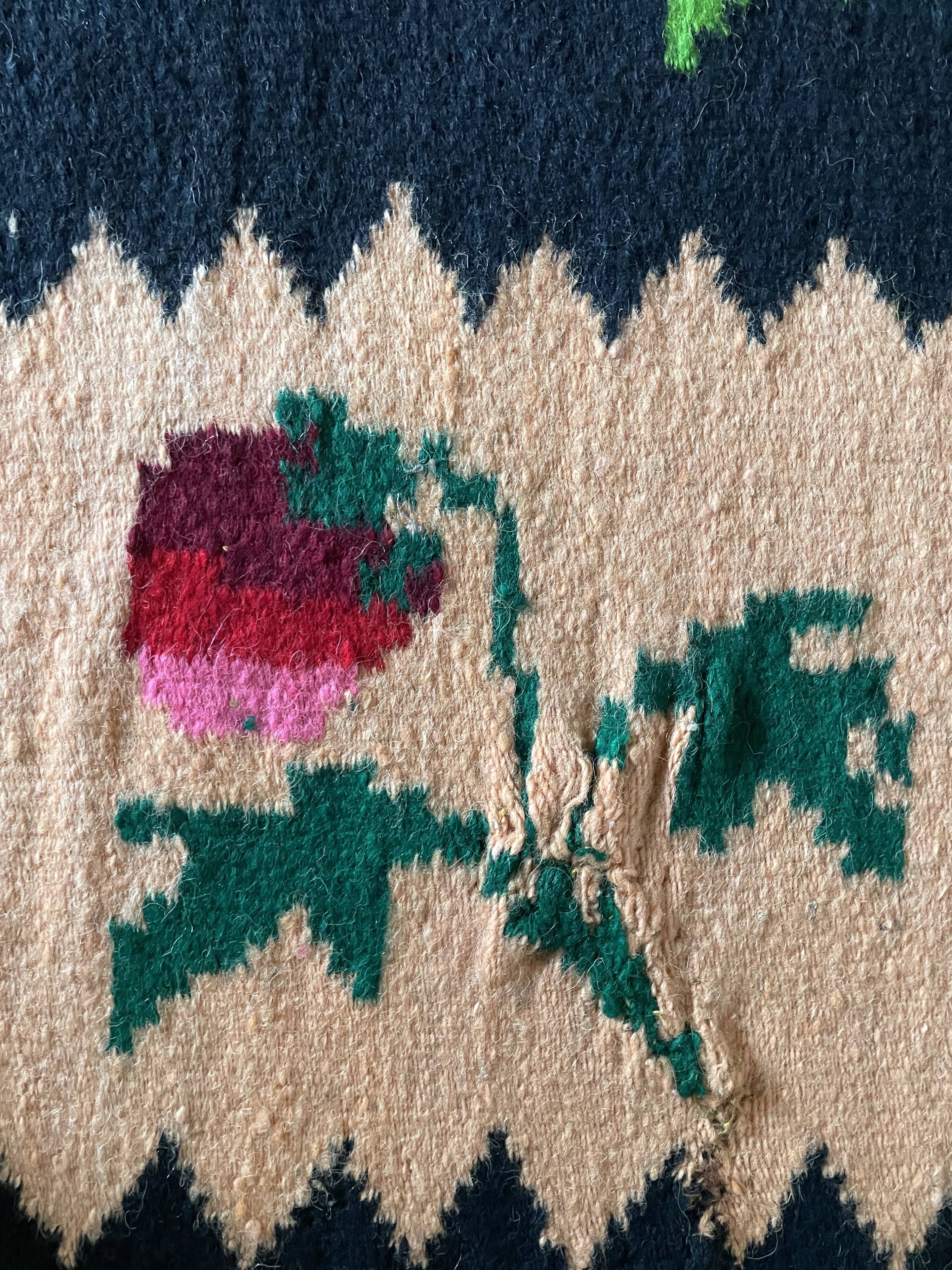 Romanian floral handwoven carpet made in wool, bohemian design with flowers