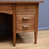 Solid oak pedestal desk, Régy establishments – 1940