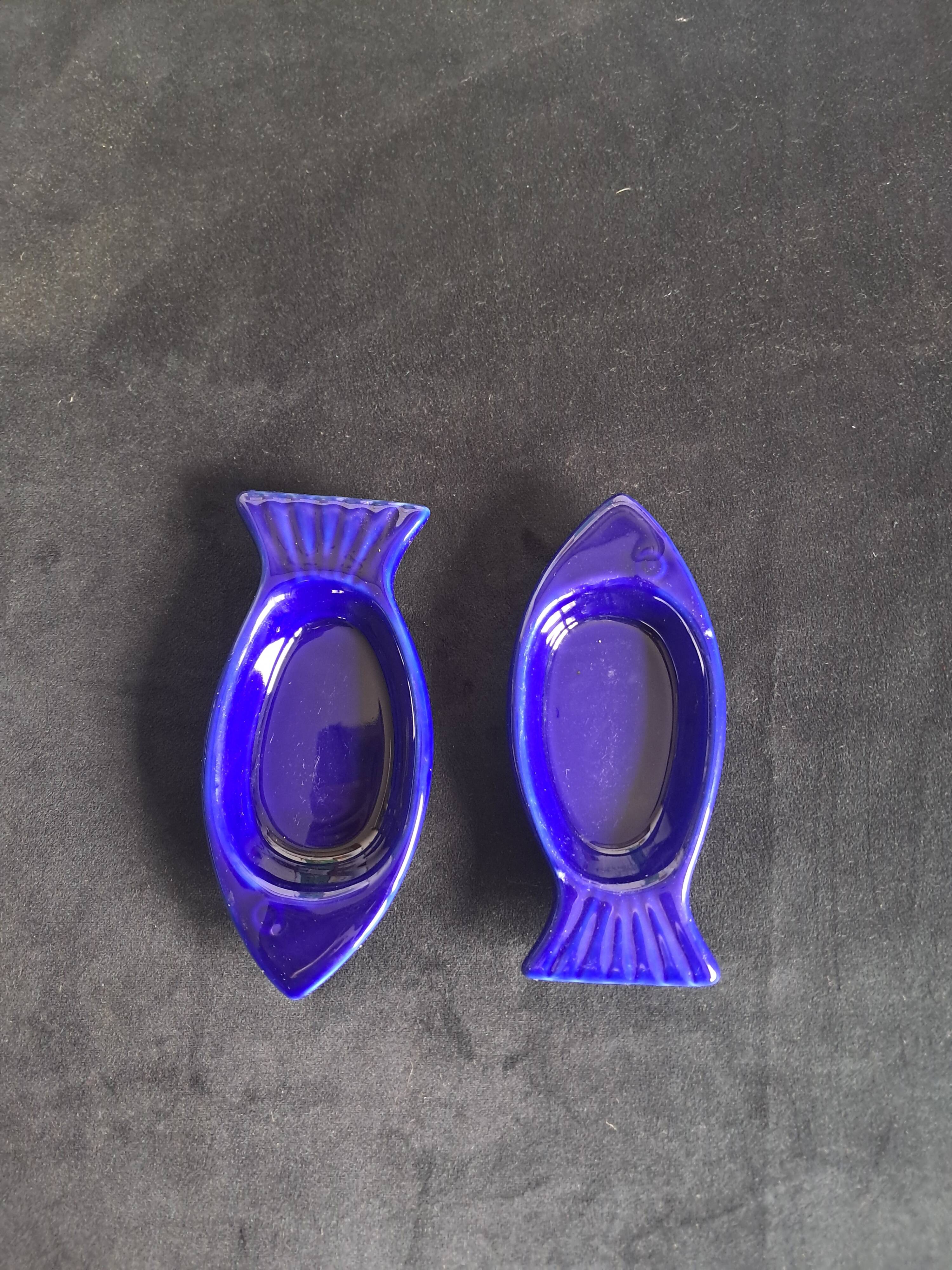 Cobalt blue ceramic plates in the shape of fish (tapas, anchovies, etc.)