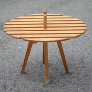 Vintage coffee table, wooden table with central handle, interior decoration, terrace, patio