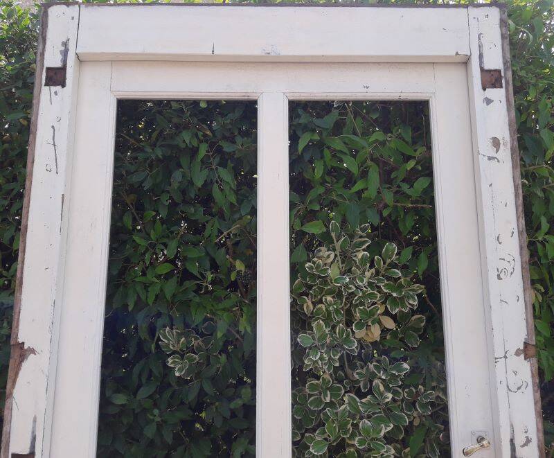 Old glazed door 211.5x105.5cm and its entrance door frame.