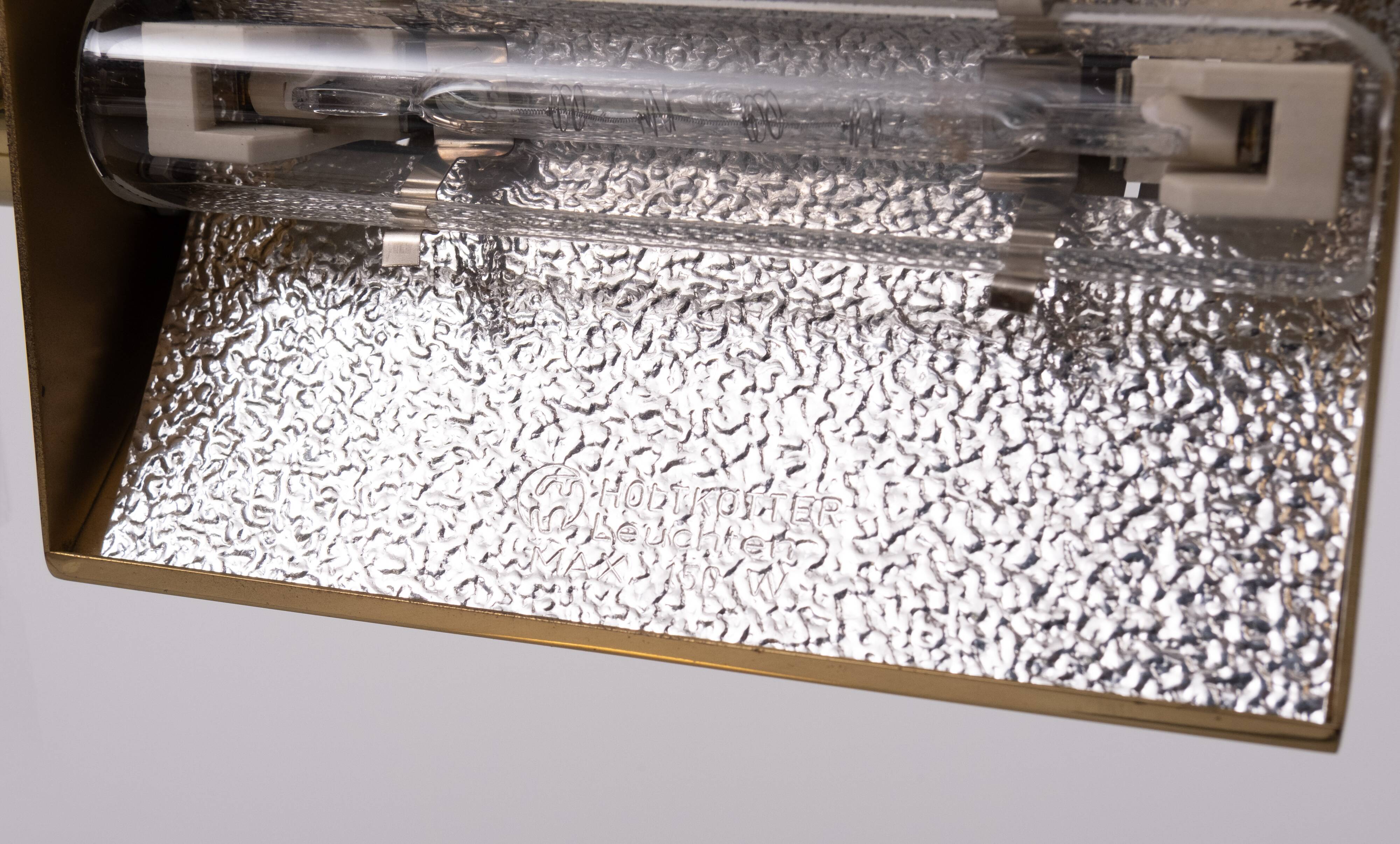 Holtkoetter adjustable Brass swing arm floor lamp. Germany